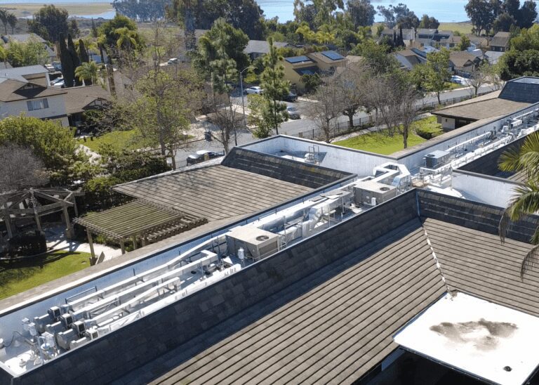 Building rooftop HVAC units and pipes.
