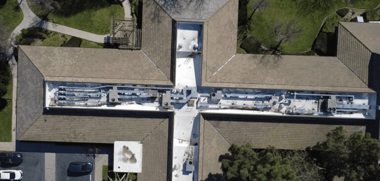 Aerial view of building roof and HVAC.