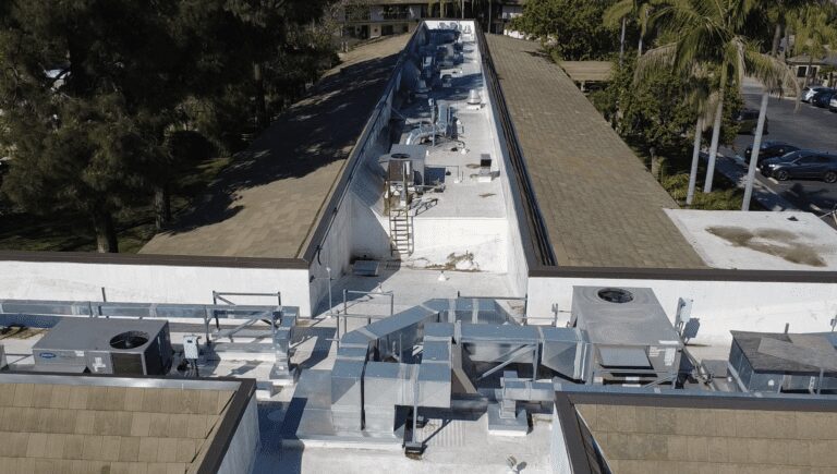 Building rooftop HVAC units and ducts.