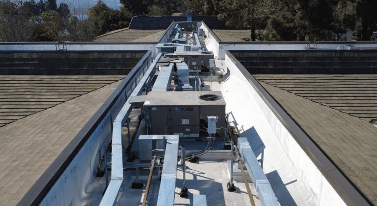 Commercial rooftop HVAC units and service walkway