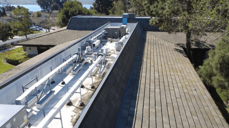 Building rooftop with HVAC equipment.