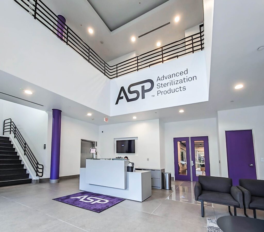 Modern office lobby with ASP branding.