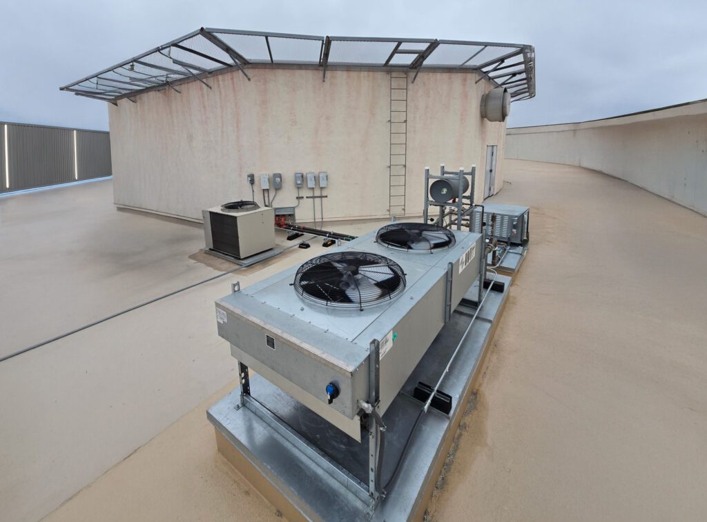 Rooftop HVAC units on building.